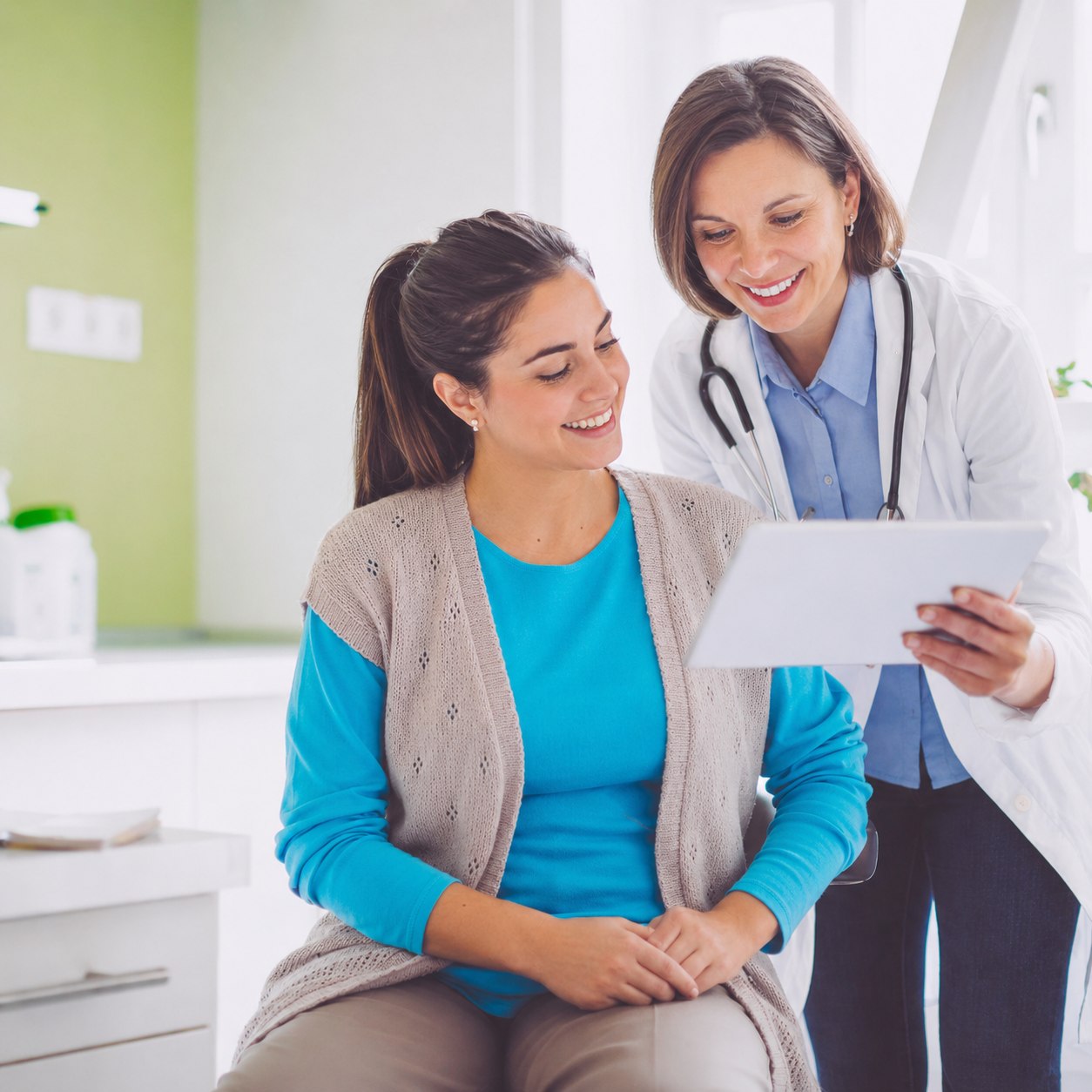 A clinician reviewing information with a patient